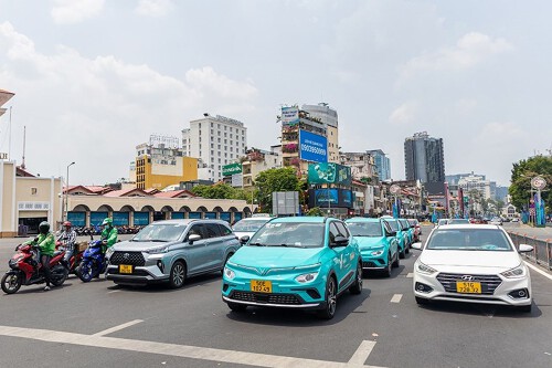 Khi xe điện trở thành "vũ khí" mới của các hãng xe công nghệ tại Việt Nam - Ảnh 2.