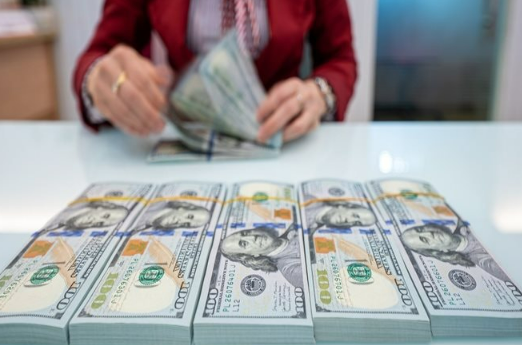 Đề xuất giao dịch từ 1.000 USD tại Trung tâm tài chính phải báo cáo - Ảnh 1.