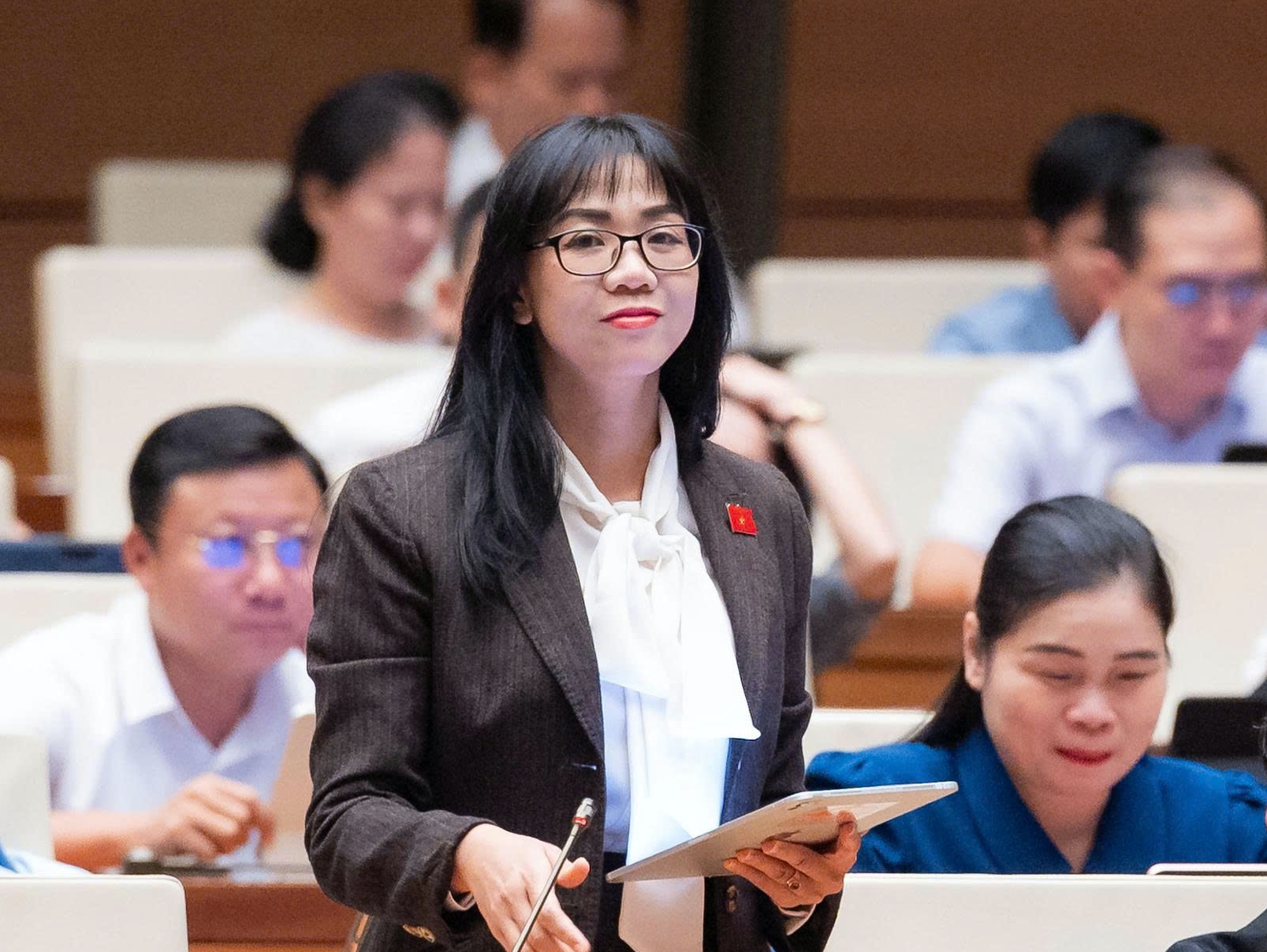 Đề xuất miễn trừ trách nhiệm cho tổ chức tín dụng khi báo cáo về các giao dịch đáng ngờ - Ảnh 2.
