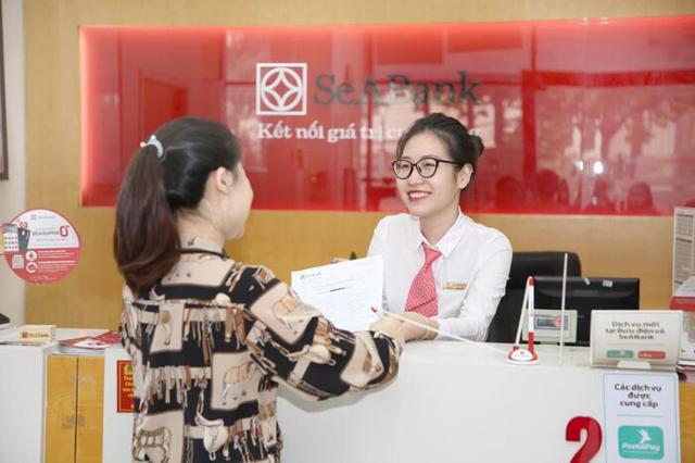SeABank báo lãi trước thuế 2.625 tỷ đồng trong 6 tháng đầu năm, tổng tài sản vượt 427 nghìn tỷ đồng. - Ảnh 1.