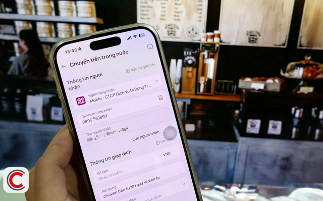 Người dùng ví điện tử có thể nhận tiền từ ngân hàng qua số điện thoại - Ảnh 1.