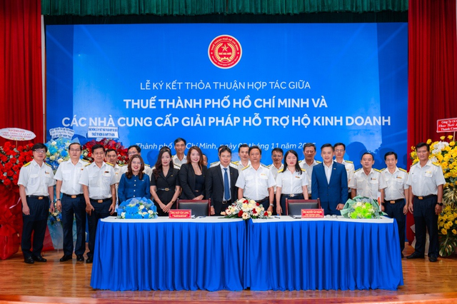ACB ký kết hợp tác với Thuế TP.HCM, tiên phong hỗ trợ hộ kinh doanh chuyển đổi trước Quyết định 3389/QĐ-BTC - Ảnh 1.