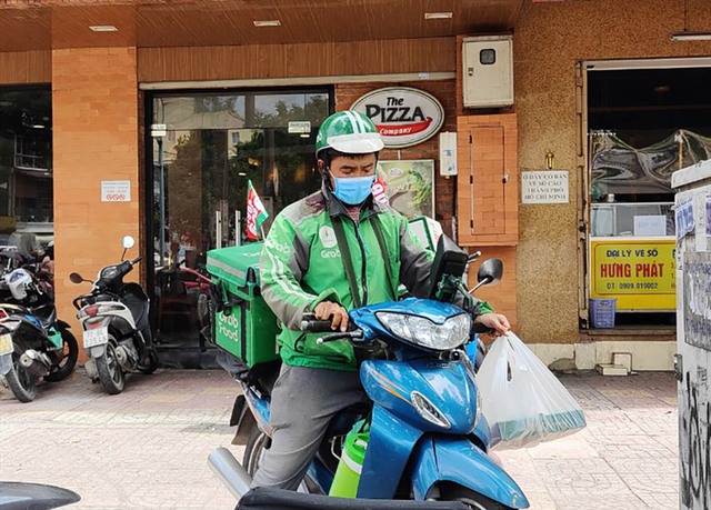 Gojek rời Việt Nam, miếng bánh thị phần mảng giao đồ ăn được Grab và ShopeeFood phân chia lại thế nào?- Ảnh 2. Gojek rời Việt Nam, miếng bánh thị phần mảng giao đồ ăn được Grab và ShopeeFood phân chia lại thế nào?- Ảnh 2.