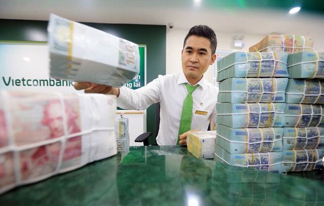Ngân hàng hé lộ kết quả kinh doanh quý 1: Lợi nhuận nhiều nhà băng tăng trưởng hai con số, dư nợ Vietcombank mở rộng thêm 68.000 tỷ- Ảnh 1.