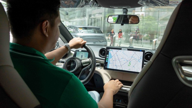 Cái bắt tay giữa Grab và hãng xe điện số 1 thế giới: Cam kết thu nhập 25 triệu đồng/kỳ cho tài xế- Ảnh 1. Cái bắt tay giữa Grab và hãng xe điện số 1 thế giới: Cam kết thu nhập 25 triệu đồng/kỳ cho tài xế- Ảnh 1.