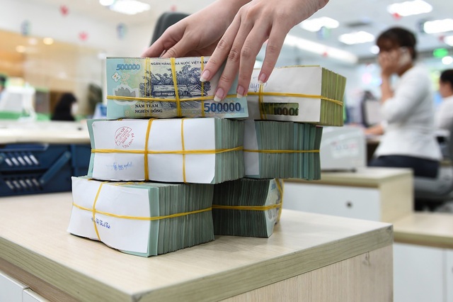 Hơn 14,7 triệu tỷ đồng tiền gửi 'chảy' về ngân hàng- Ảnh 1. Hơn 14,7 triệu tỷ đồng tiền gửi 'chảy' về ngân hàng- Ảnh 1.