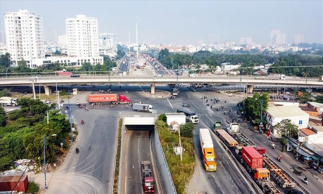 Diễn biến mới nhất về tiến độ xây cầu Cát Lái - Ảnh 1.
