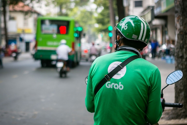 Giám đốc đối ngoại Grab: Đơn vị xây trạm sạc xe điện nhận hỗ trợ từ Nhà nước thì phải cho phép nhiều hãng xe dùng chung - Ảnh 1.