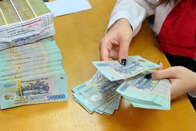 Hậu chuyển giao bắt buộc, các ngân hàng ‘0 đồng’ báo lãi bao nhiêu? - Ảnh 1.