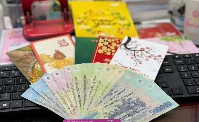 Thưởng Tết có bị trừ thuế không? Người lao động phải nộp bao nhiêu tiền thuế thu nhập cá nhân?- Ảnh 1.