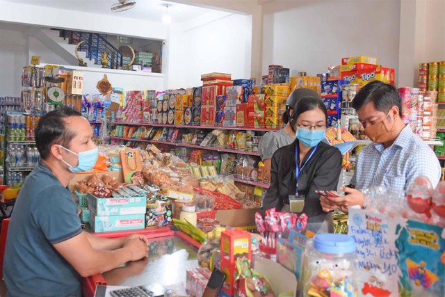 Hộ kinh doanh băn khoăn về ngưỡng thuế GTGT: Kiếm thêm 5% nhưng tiền thuế có thể tăng thêm tới 50 triệu - Ảnh 1.