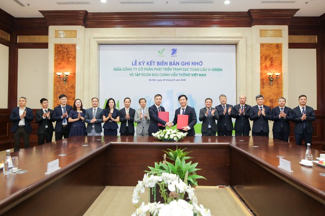 Tỷ phú Phạm Nhật Vượng tăng tốc hạ tầng xe điện: V-Green bắt tay VNPT triển khai hàng nghìn tủ đổi pin  - Ảnh 1.