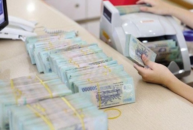 Tiền gửi dân cư lập kỷ lục mới, vượt 10,5 triệu tỷ đồng - Ảnh 1.