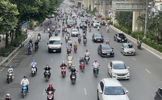 Bất ngờ về tình hình không khí Hà Nội, TP.HCM sau 1 tháng dùng xăng E10- Ảnh 1.