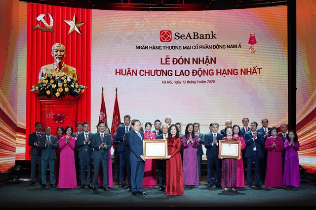 Doanh nhân Nguyễn Thị Nga được trao tặng Danh hiệu Anh hùng Lao động, Ngân hàng SeABank đón nhận Huân chương Lao động hạng Nhất & Bằng khen của Bộ Công an - Ảnh 1.