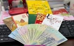 Thưởng Tết có bị trừ thuế không? Người lao động phải nộp bao nhiêu tiền thuế thu nhập cá nhân?